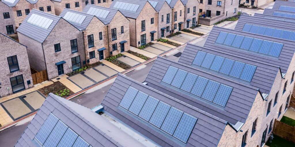 Aerial,View,Of,Rows,Of,New,Build,Modular,Terraced,Houses